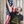 Load image into Gallery viewer, t-shirt mockup of a bearded man with an american flag
