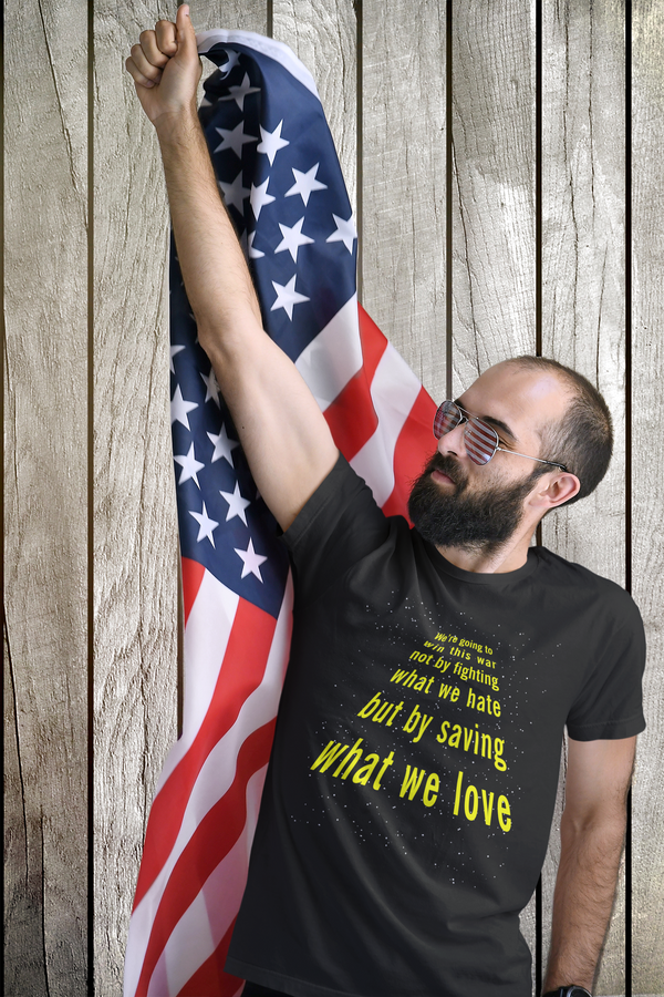 t-shirt mockup of a bearded man with an american flag