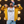 Load image into Gallery viewer, t shirt mockup of a rapper wearing gold chains on a set
